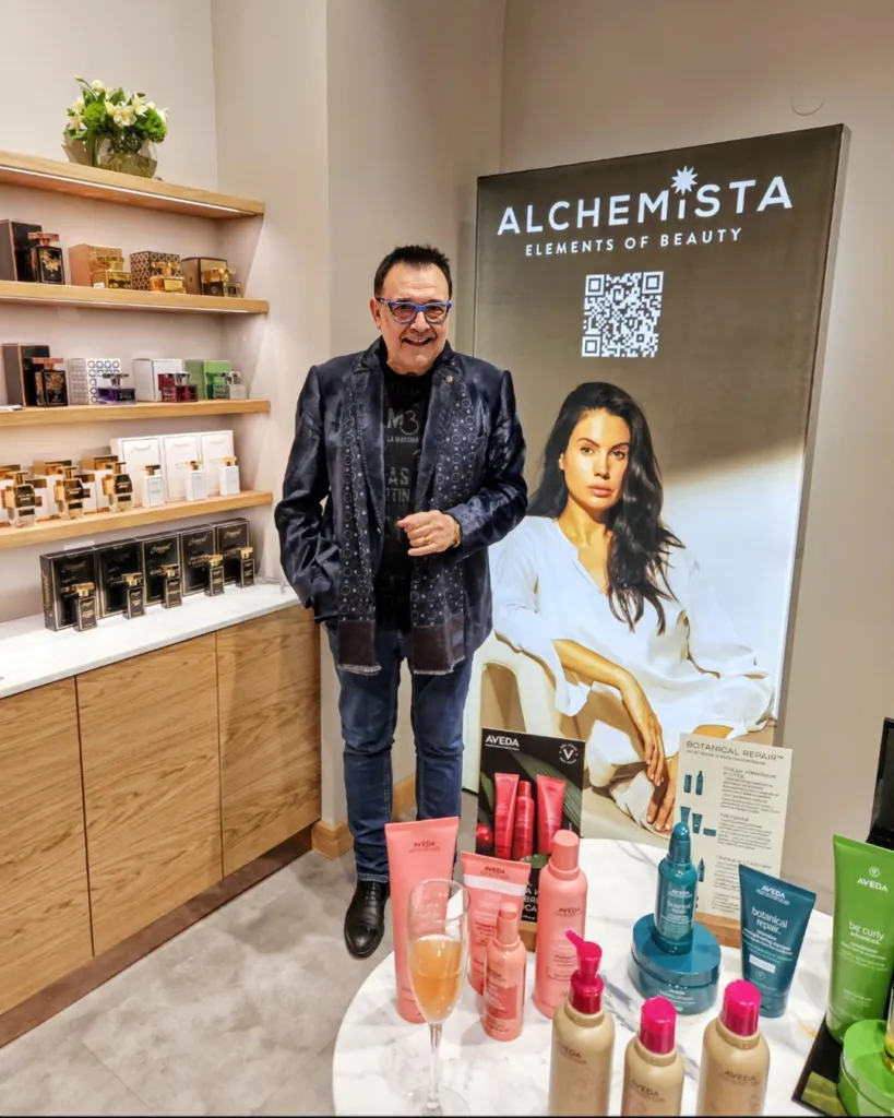 Проф. Любомир Стойков сред продуктите на Aveda, които са част от портфолиото на Christian of Roma. Фото: Алма Комуникация