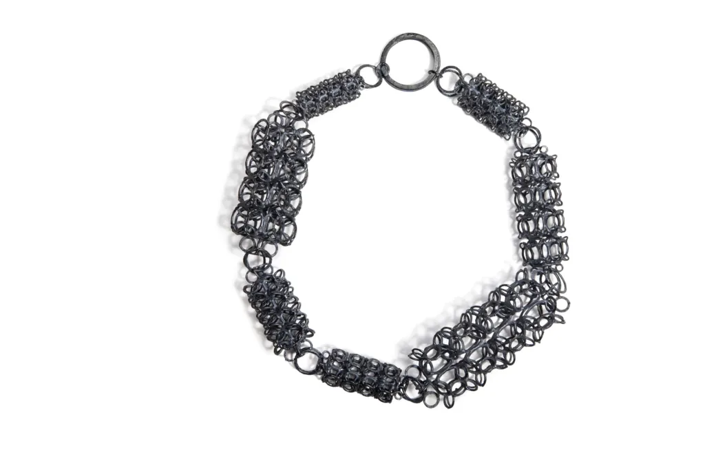 Произведение на Сърдъмов от „Точки на пресичане“ / Intersections - Колие (почернено сребро) - 23 х 23 х 4,5 см.  Фото: Венцислава Василева / Архив на автора